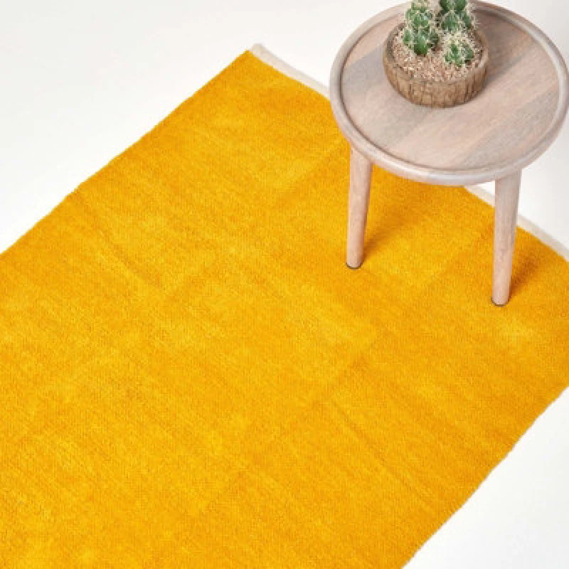 Image of Homescapes Mustard 100% Cotton Plain Chenille Rug With Natural Trim, 90 X 150 Cm